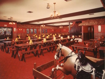 Interior view of a Straw Hat dining room including a play horse for children to ride